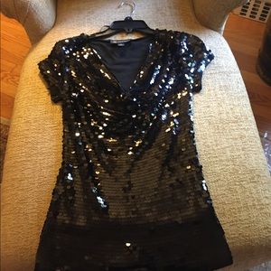 Sequin blouse.